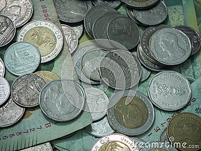 Lots of coins, piles on the floor Stock Photo