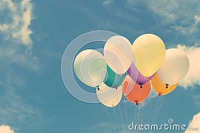 Lots of colorful balloons on the blue sky, concept of love in summer and valentine, wedding honeymoon. Stock Photo