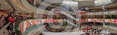 Lots of consumers visiting a big shopping Mall on the new year holiday Editorial Stock Photo