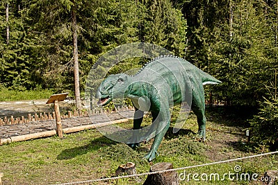 Lots of different dinosaurs in the park Stock Photo