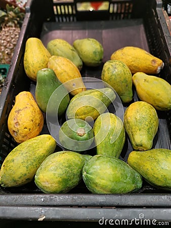 lots of dwarf papaya fruits. Stock Photo