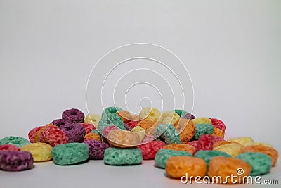 Lots of fruit cereal wheels or froot loops Stock Photo