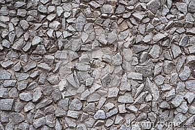 Lots of gray stones in the cement, texture. Gray rubble in concrete, background Stock Photo