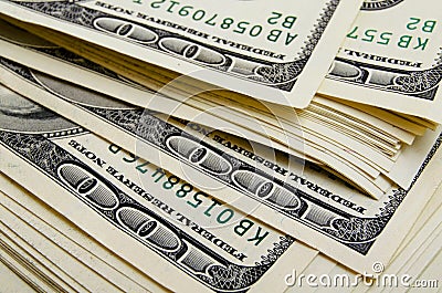 Lots of one hundred of dollar bills. Stock Photo