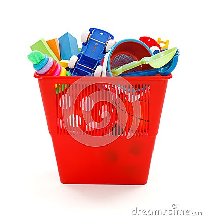 Lots of plastic toys thrown in garbage bin Stock Photo