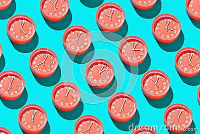 Lots of round alarm clocks showing different times Stock Photo