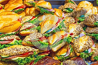 Lots of sandwiches in a display window of a diner cooking for sale Stock Photo