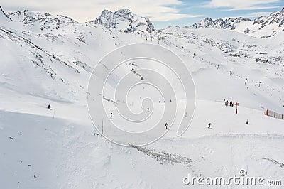 Lots of skiers and snowboarders, large group. Side perspective view Stock Photo