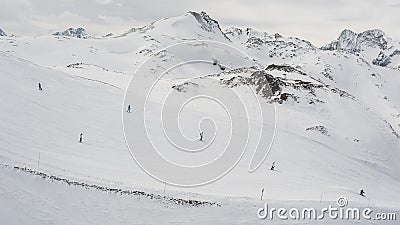 Lots of skiers and snowboarders, large group. Side perspective view Stock Photo