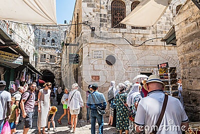 Lots of visitors or pilgrims at station 5 of Via Dolorosa in old city of Jerusalem, Israel Editorial Stock Photo