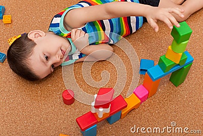 Lottle boy playing toy blocks Stock Photo