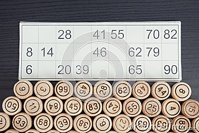 Lotto card close-up and wooden kegs Stock Photo