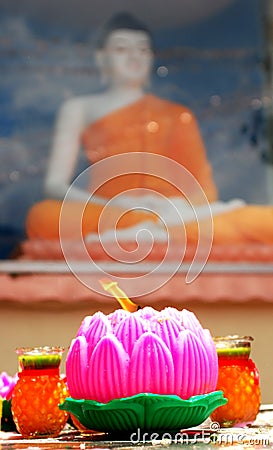 Lotus candle lit on Wesak festival Stock Photo