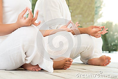 Lotus pose at yoga closeup Stock Photo