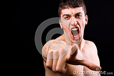 Loud scream of angry furious violent man Stock Photo