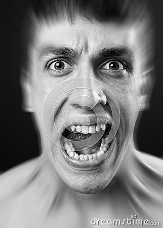 Loud scream of scared frighten man Stock Photo