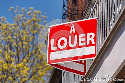 A Louer sign For rent in french in Canada Stock Photo