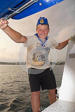 Loughing boy in the sea Stock Photo