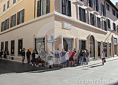 Louis Vuitton Store in Rome, Italy with People Waiting Outside Editorial Stock Photo