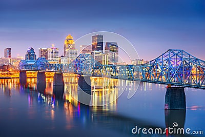 Louisville, Kentucky, USA downtown skyline on the Ohio River at dusk Stock Photo