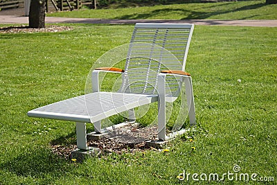 Lounge chair sunbathing metal urban furniture Stock Photo