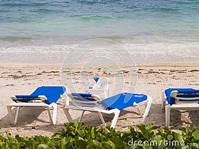 Lounge Chairs on the Beach Stock Photo