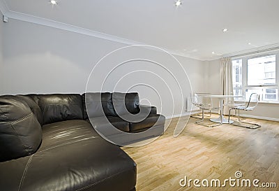 Lounge with massive leather sofa Stock Photo