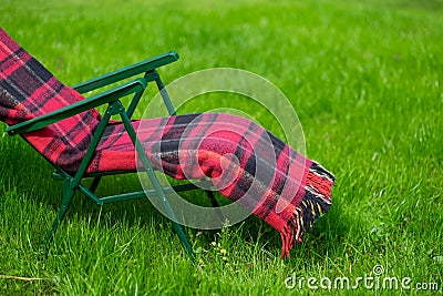 Lounge seat and green grass lawn in country side Stock Photo