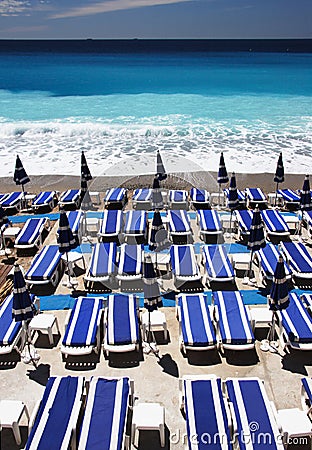 Loungers on the beach portrait Stock Photo