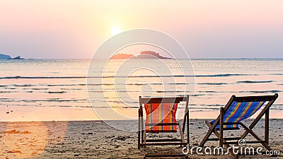 Loungers at the seaside at sunset. Nature. Stock Photo