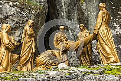 Lourdes, France, June 24 2019: Way of the Cross of Jesus, fragment of the fourteenth station Editorial Stock Photo