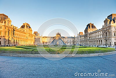 Louvre museum with landmark entrance - pyramid Editorial Stock Photo