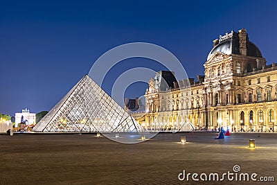 Louvre palace and pyramids at night, Paris, France Editorial Stock Photo