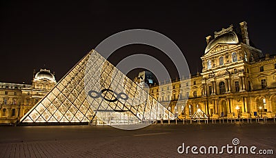 The Louvre of Paris in France by night Editorial Stock Photo