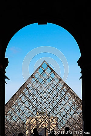 The Louvre Pyramid from the Eastern entrance Editorial Stock Photo