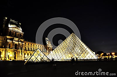 Louvre Pyramid in Paris, night with light Editorial Stock Photo