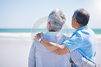 Love, back and senior couple on a beach, hug and bonding for relationship, summer holiday and marriage. Romance Stock Photo