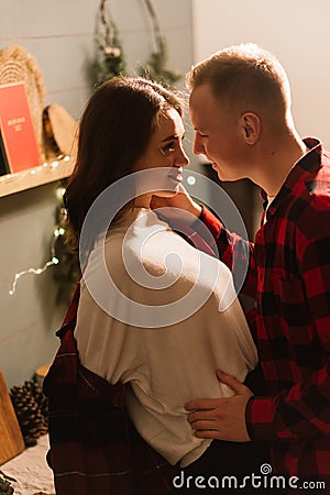 Love, christmas, couple, proposal concept - happy man giving diamond engagement ring to woman Stock Photo