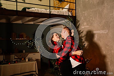 Love, christmas, couple, proposal concept - happy man giving diamond engagement ring to woman Stock Photo