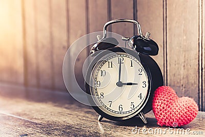 Love clock vintage tone timed 3 o`clock. Stock Photo