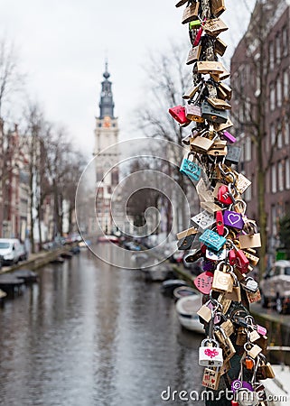 Love locks at Amsterdam bridge Editorial Stock Photo