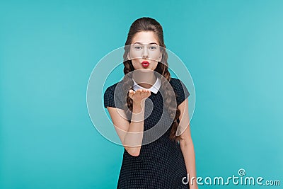 Love concept. Beautiful lovely woman send air kiss at camera. Stock Photo