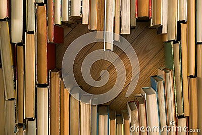 Love concept of heart shape from old vintage books on wooden flo Stock Photo