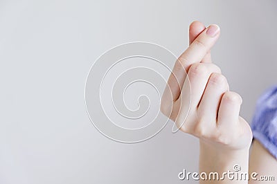Love concept of Young woman hand making mini heart with copy space Stock Photo
