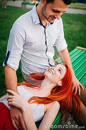 Love couple leisure on bench, romantic meeting Stock Photo