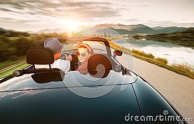 In love couple traveling by cabriolet car Stock Photo