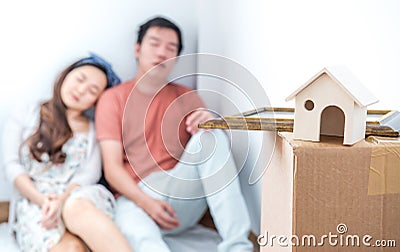 Love couples Tried because moving into the house. Stock Photo