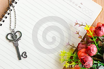 Love diary and heart shape key necklace. Stock Photo