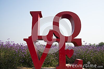 Love, English font, flowers, Verbena Stock Photo