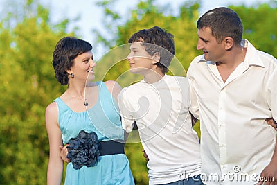 Love and Family Values Concepts. Happy Caucasian Family of Three Spending Time Together Stock Photo